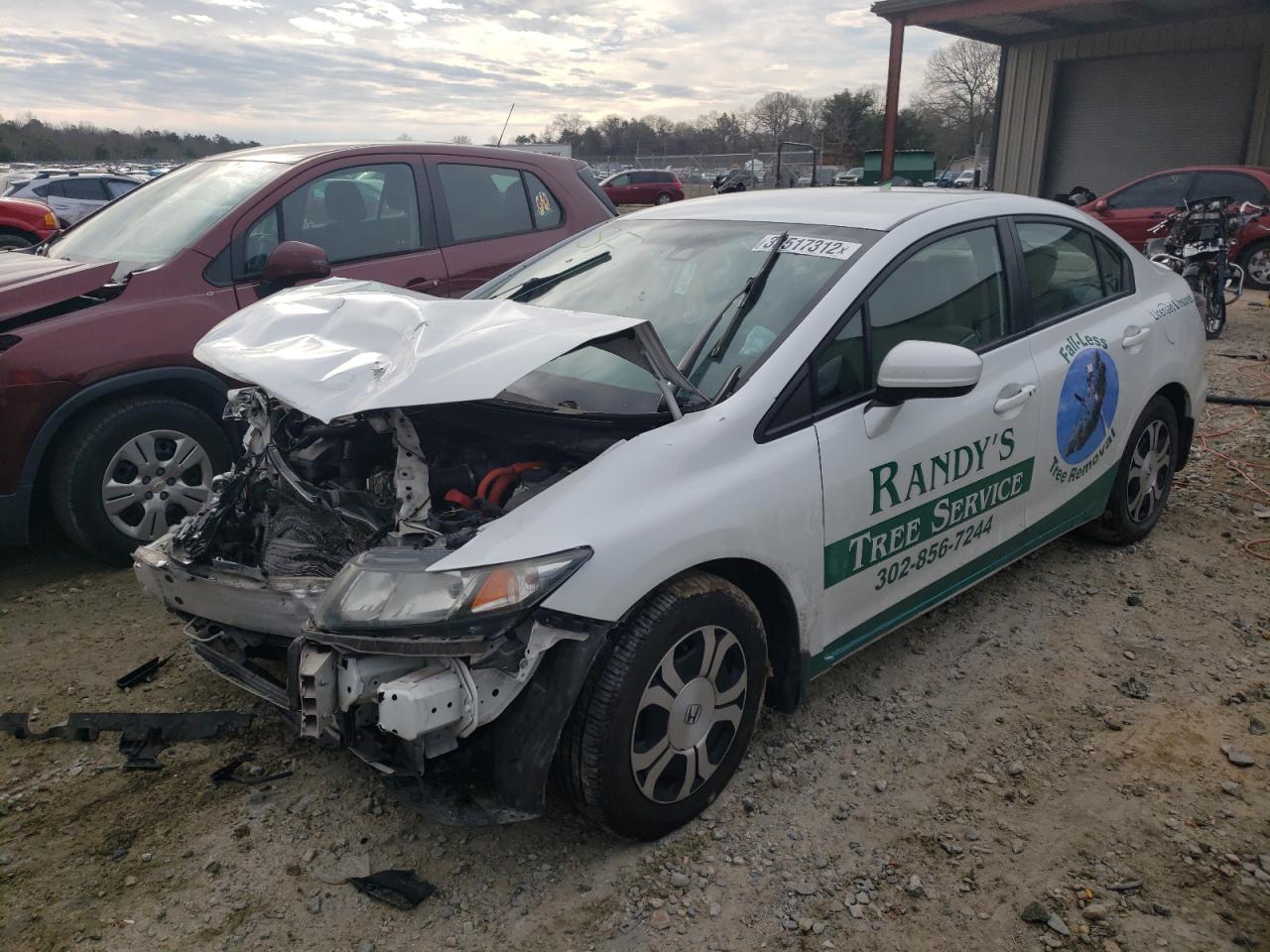 Photo 2 from auction – 2014 HONDA CIVIC HYBR with VIN 19XFB4F29EE001229