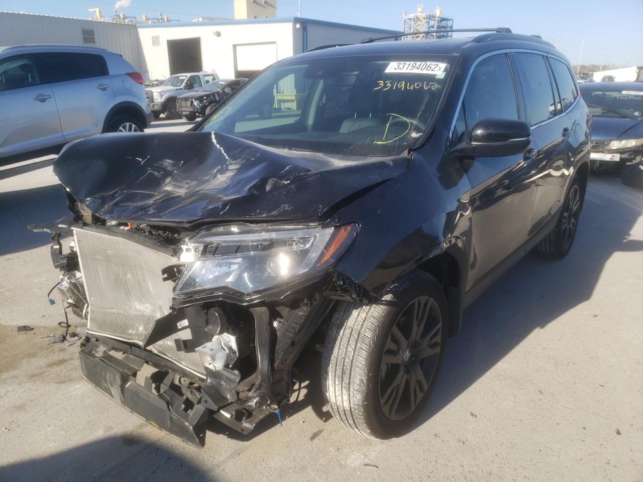 Photo 2 from auction – 2021 HONDA PILOT SE with VIN 5FNYF5H23MB032601