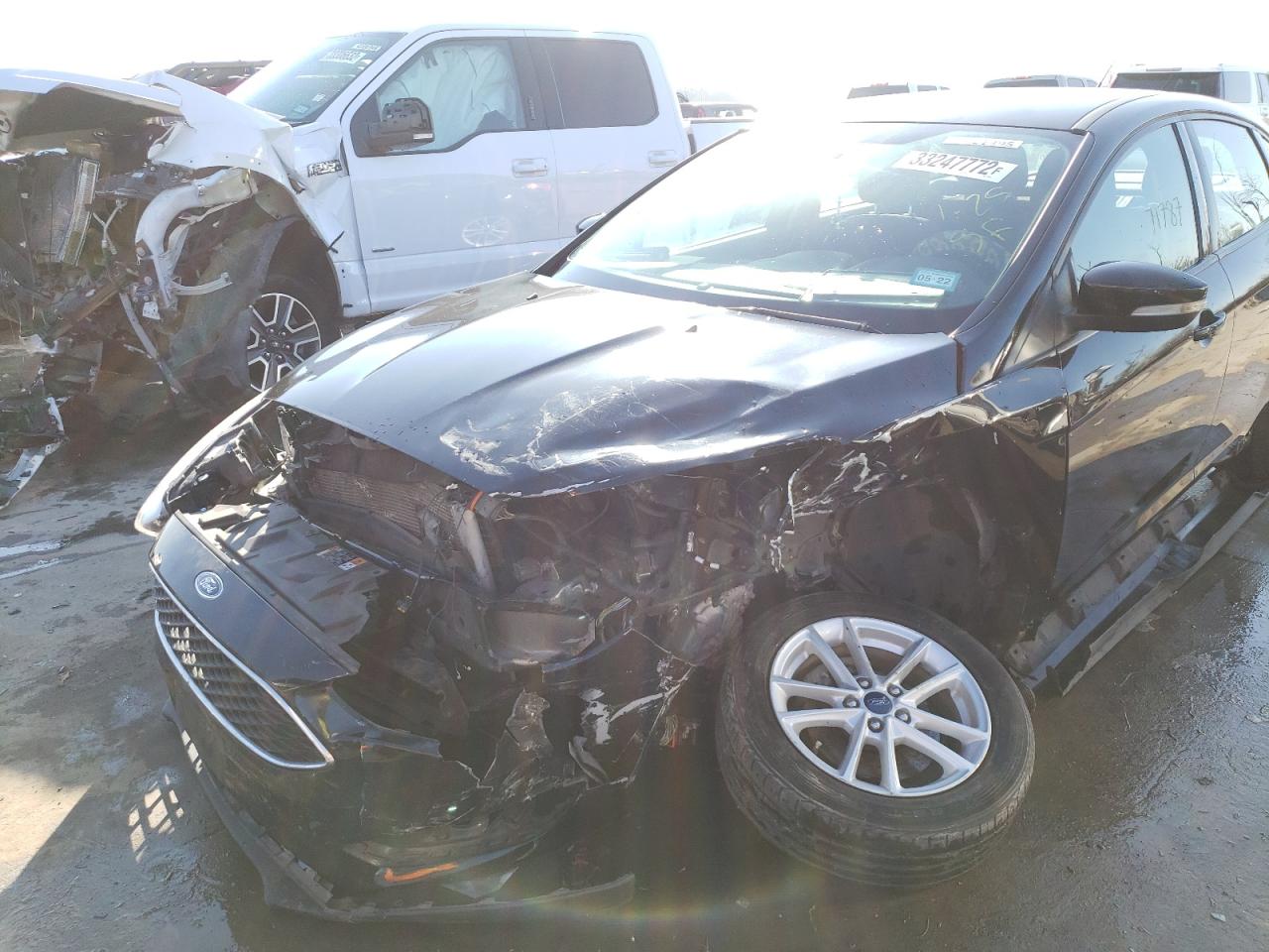 Photo 9 from auction – 2017 FORD FOCUS SE with VIN 1FADP3F23HL224001