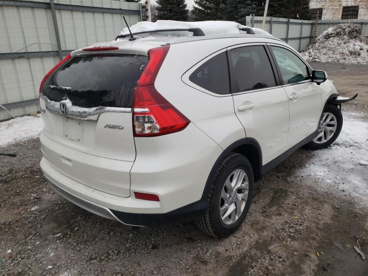 Photo 4 from auction – 2016 HONDA CR-V EXL with VIN 5J6RM4H74GL034160