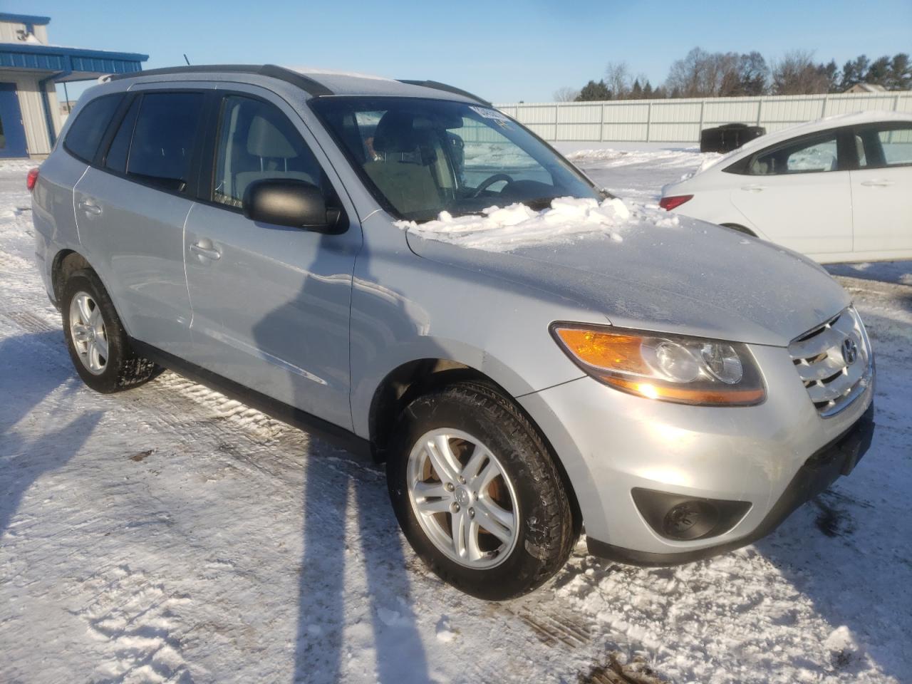 HYUNDAI SANTA FE G 2010 with VIN 5NMSGDAB9AH391386 - Photo from auction