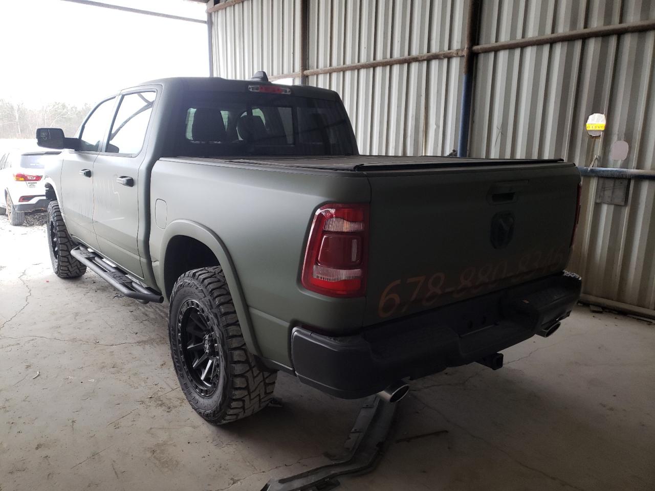 Photo 3 from auction – 2021 RAM 1500 LARAM with VIN 1C6SRFJT7MN528466