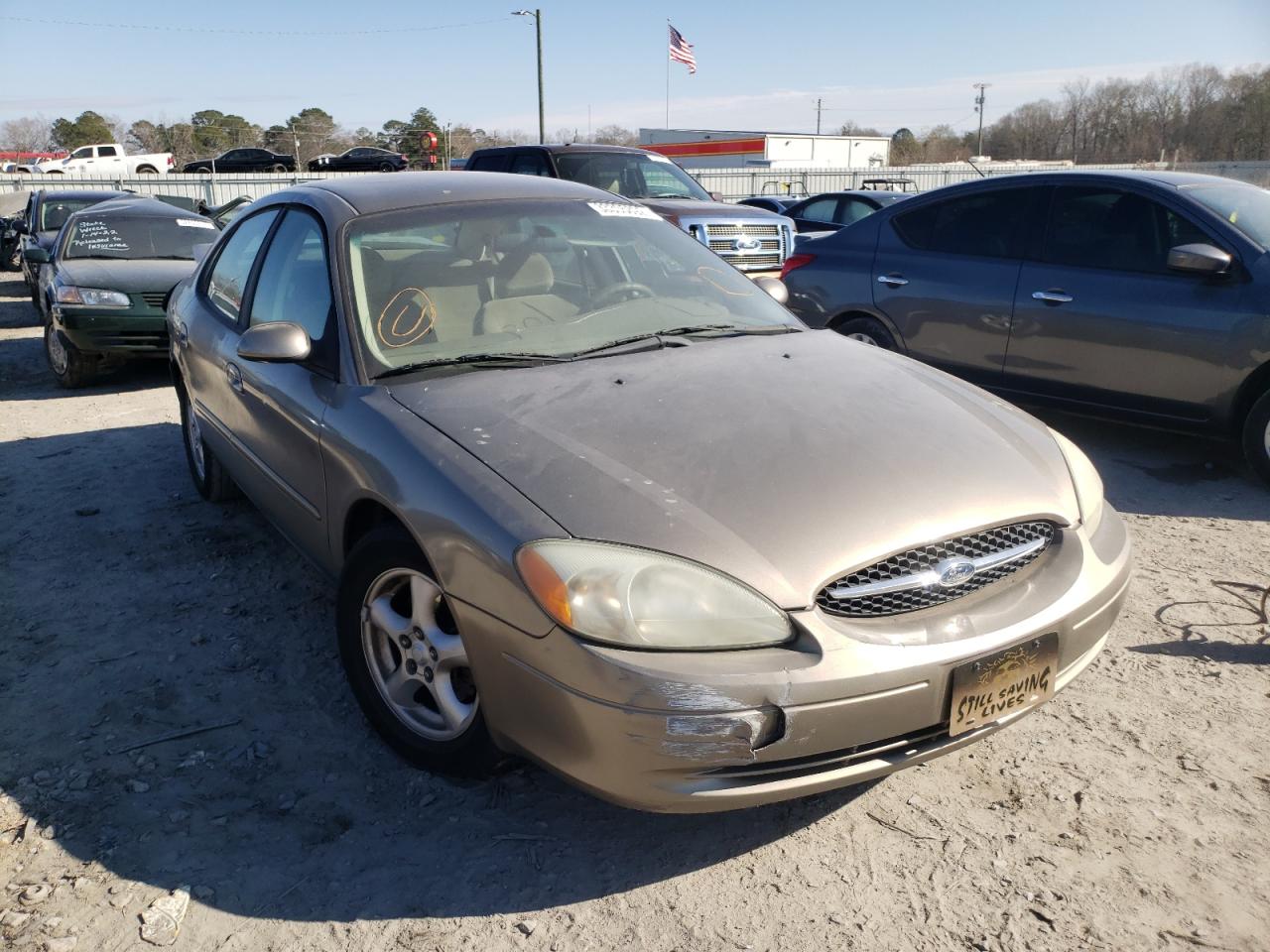 FORD TAURUS 2003 with VIN 1FAFP53U73A129360 - Photo from auction
