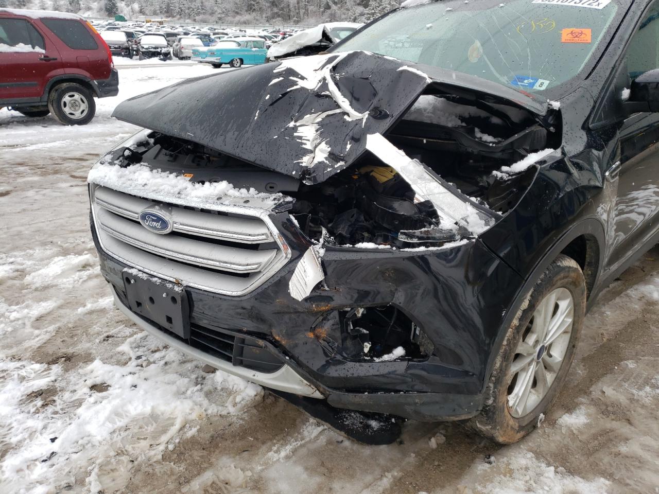 Photo 9 from auction – 2018 FORD ESCAPE SE with VIN 1FMCU9GD1JUA75360