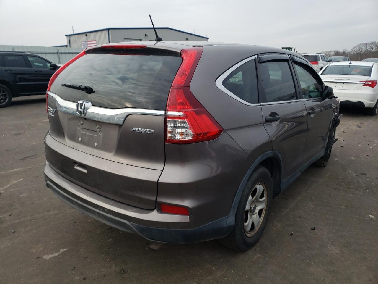 Photo 4 from auction – 2015 HONDA CR-V LX with VIN 5J6RM4H32FL130431