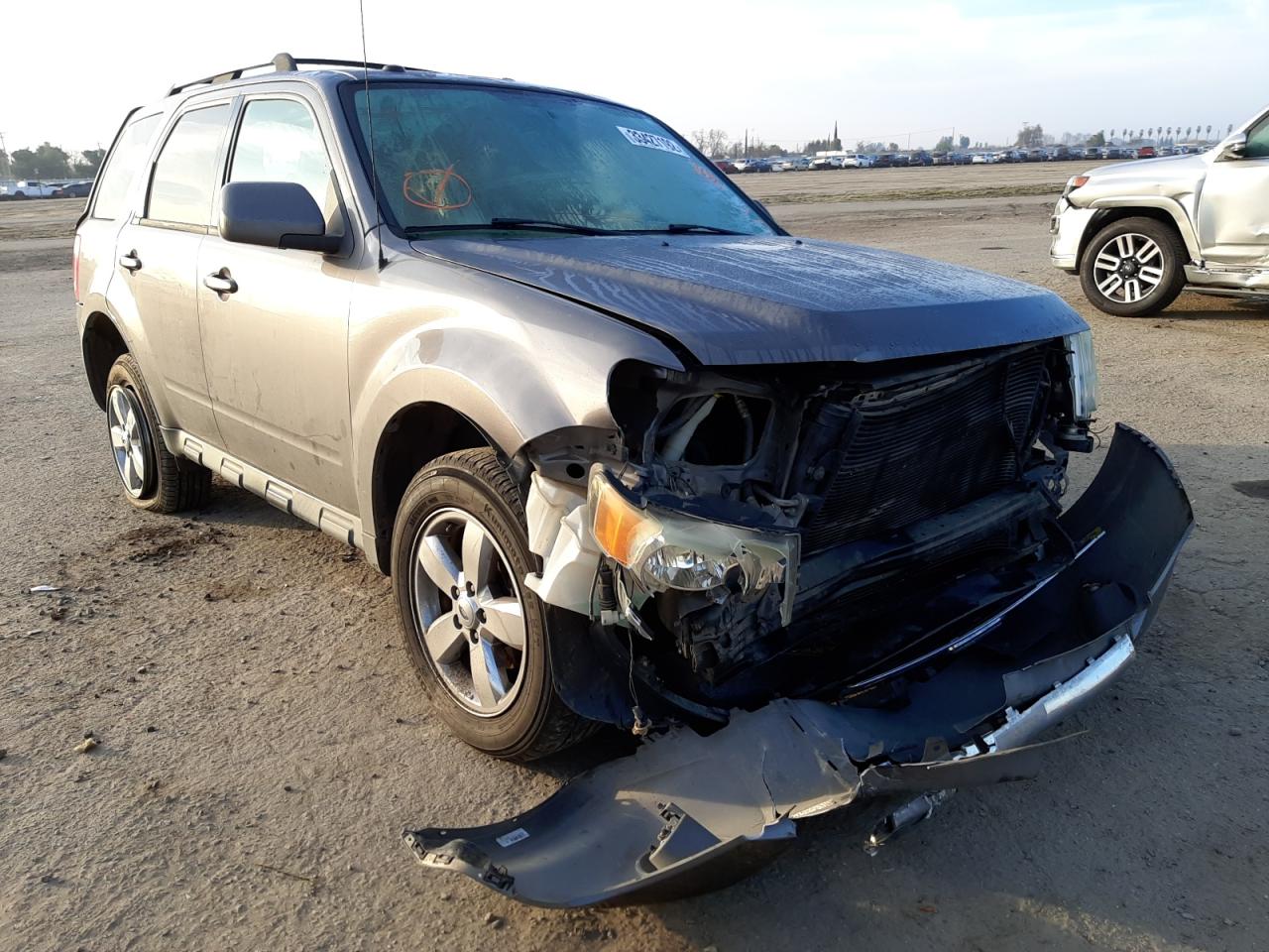 FORD ESCAPE LIM 2010 with VIN 1FMCU0EG3AKD20115 - Photo from auction