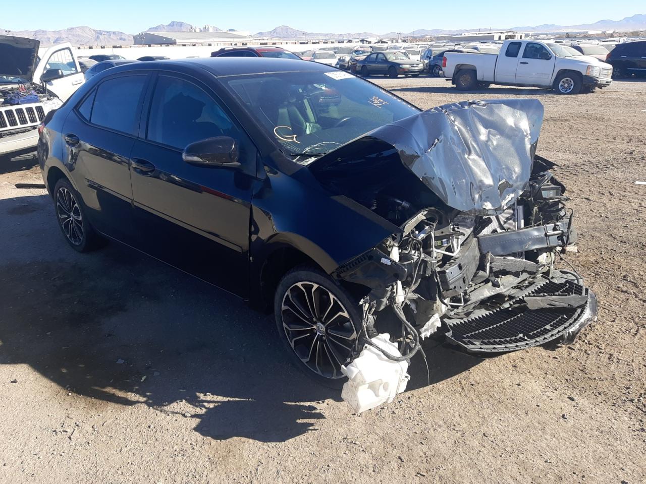 TOYOTA COROLLA L 2015 with VIN 5YFBURHE4FP307929 - Photo from auction