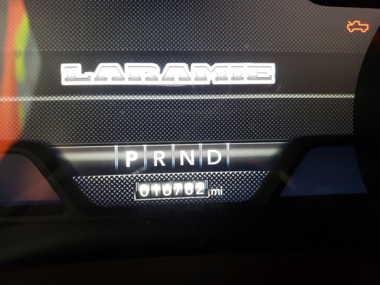 Photo 8 from auction – 2021 RAM 1500 LARAM with VIN 1C6SRFJT7MN528466
