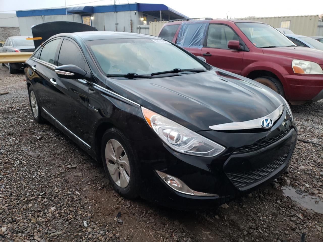 HYUNDAI SONATA HYB 2015 with VIN KMHEC4A48FA135344 - Photo from auction