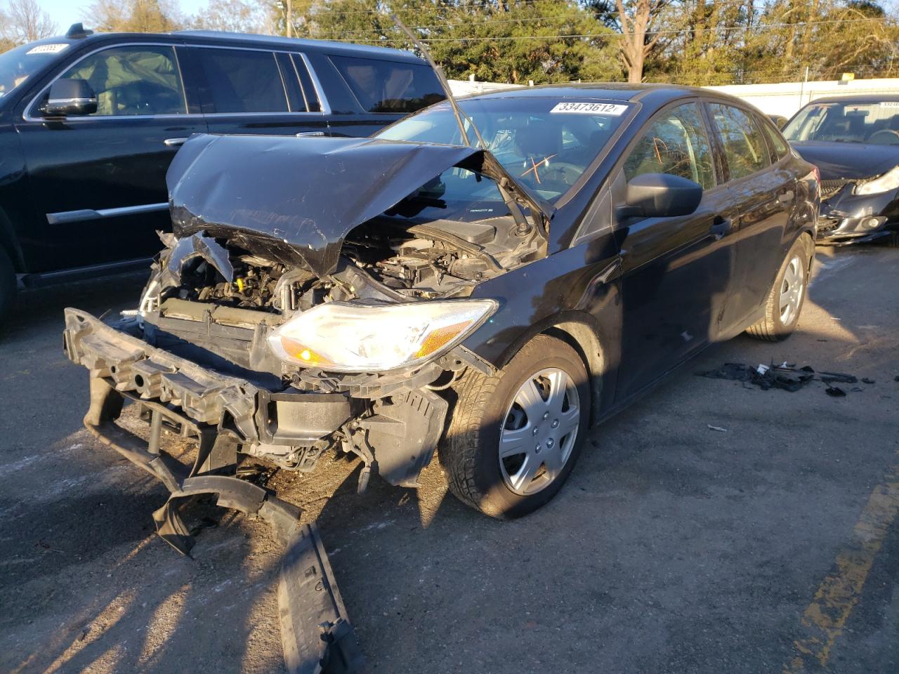 Photo 2 from auction – 2012 FORD FOCUS S with VIN 1FAHP3E26CL371179
