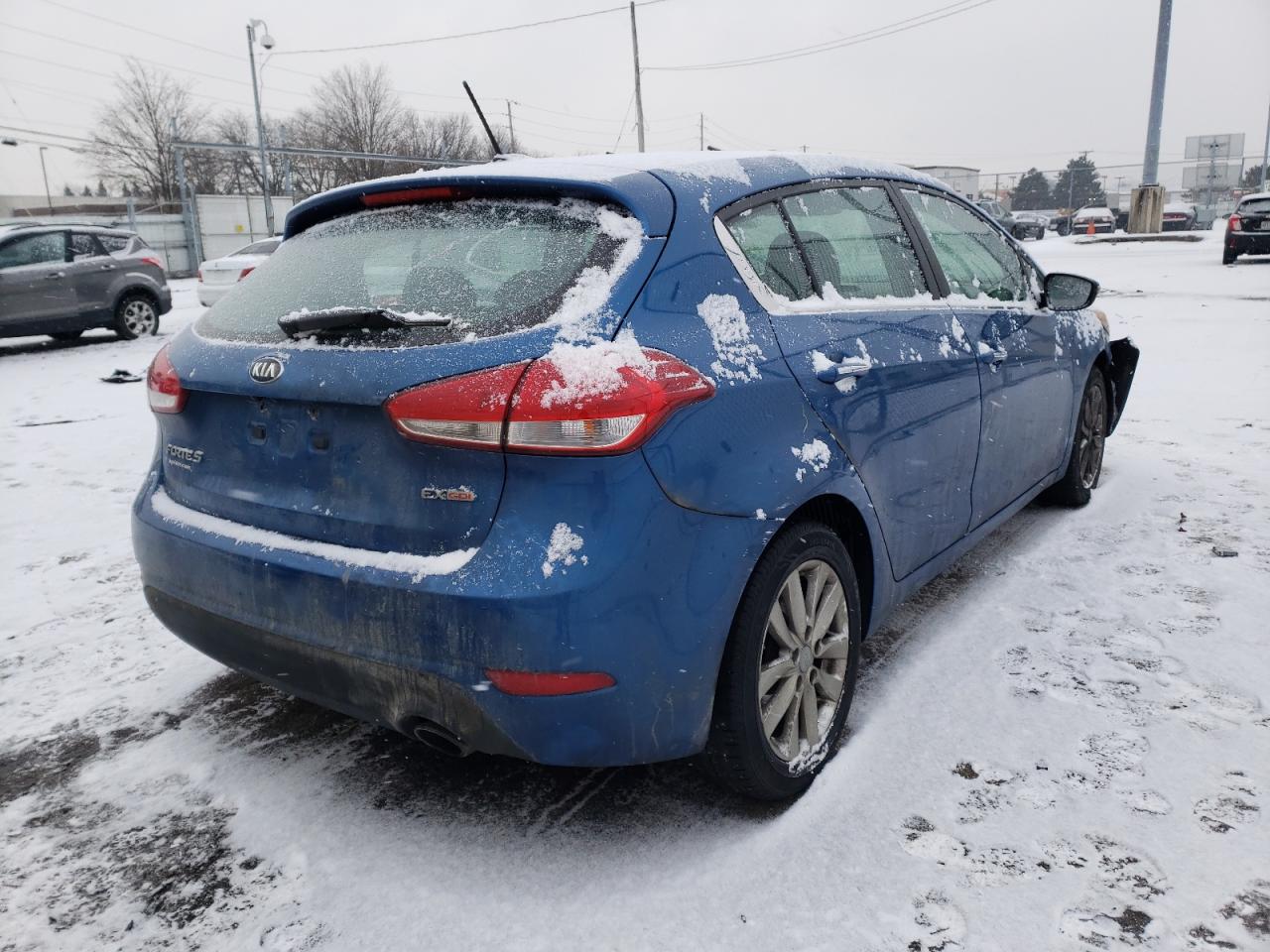 Photo 4 from auction – 2014 KIA FORTE EX with VIN KNAFX5A8XE5165729