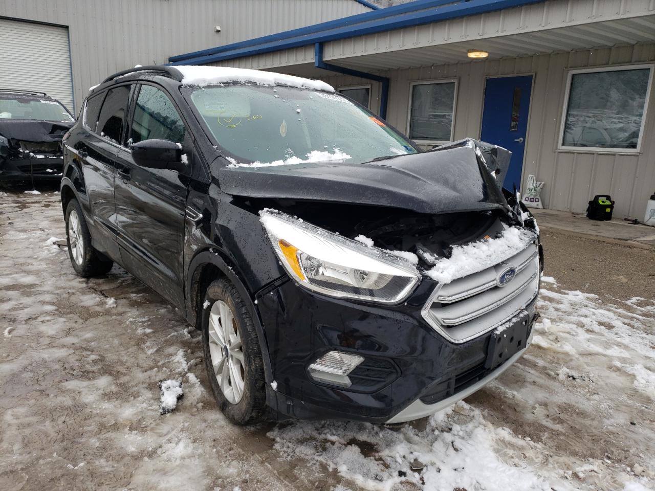 FORD ESCAPE SE 2018 with VIN 1FMCU9GD1JUA75360 - Photo from auction