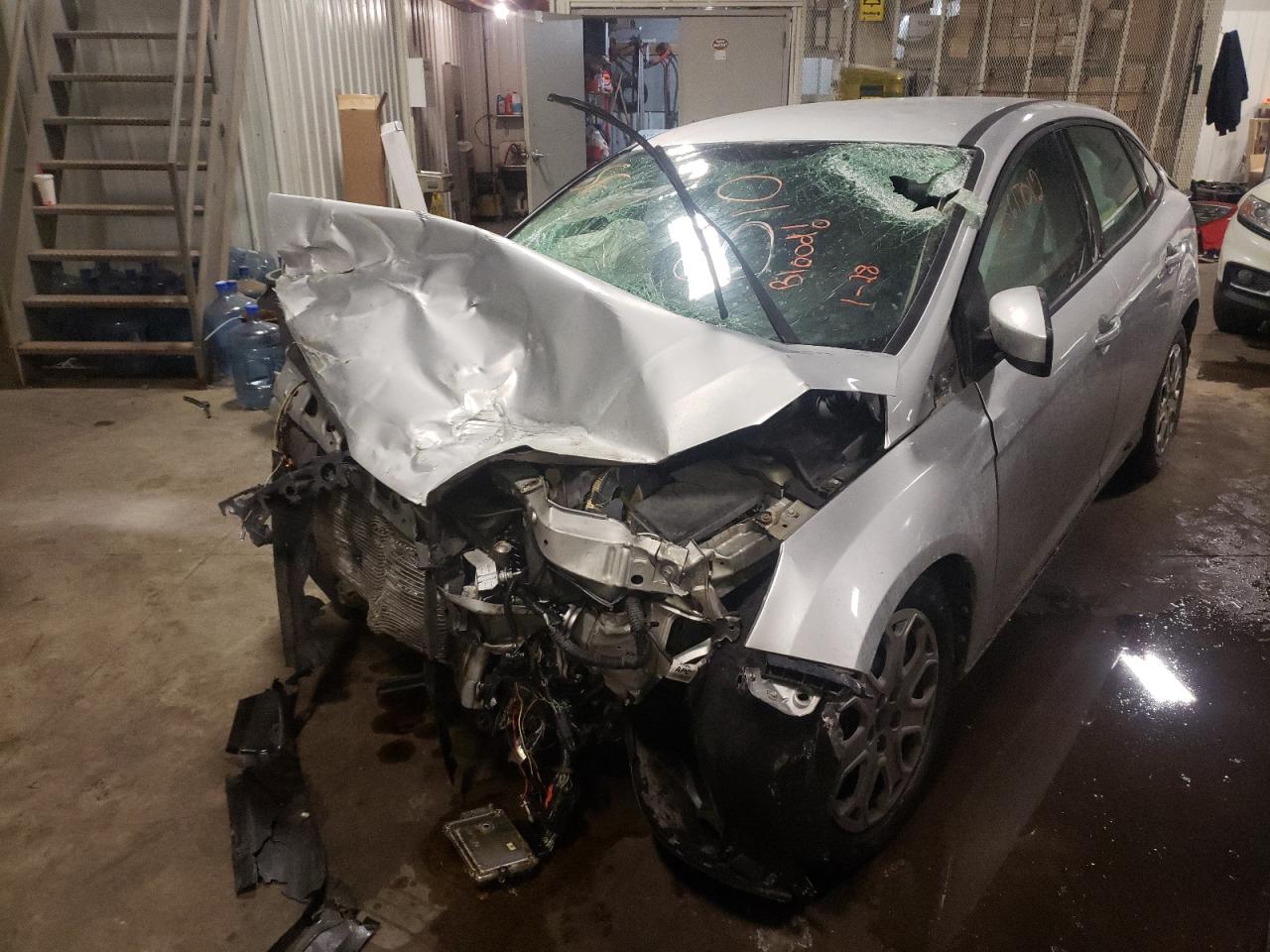 Photo 2 from auction – 2012 FORD FOCUS SE with VIN 1FAHP3F23CL217740