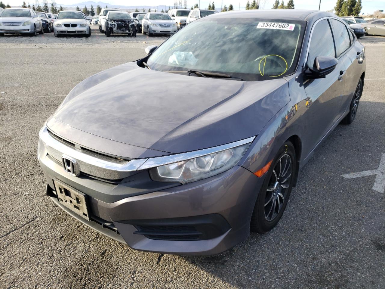 Photo 2 from auction – 2016 HONDA CIVIC LX with VIN 19XFC2F50GE201270