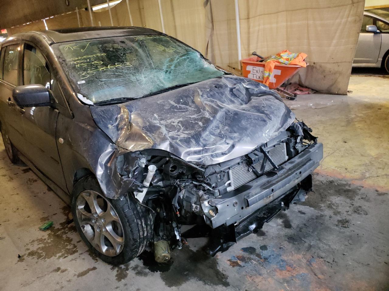 Photo 9 from auction – 2009 MAZDA 5 with VIN JM1CR293X90358683