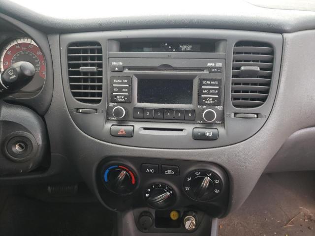 Photo 10 from auction – 2011 KIA RIO BASE with VIN KNADH4A32B6753052