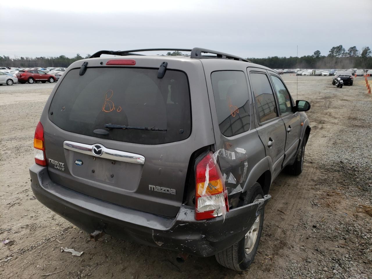 Photo 4 from auction – 2003 MAZDA TRIBUTE LX with VIN 4F2CZ94103KM14060
