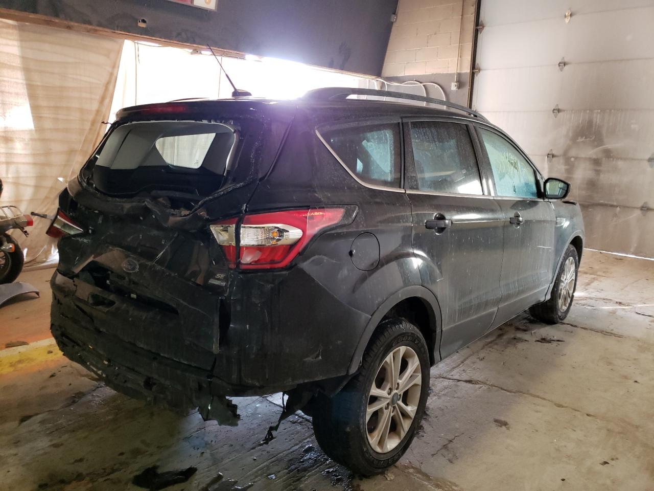 Photo 4 from auction – 2018 FORD ESCAPE SE with VIN 1FMCU9GD0JUB46984