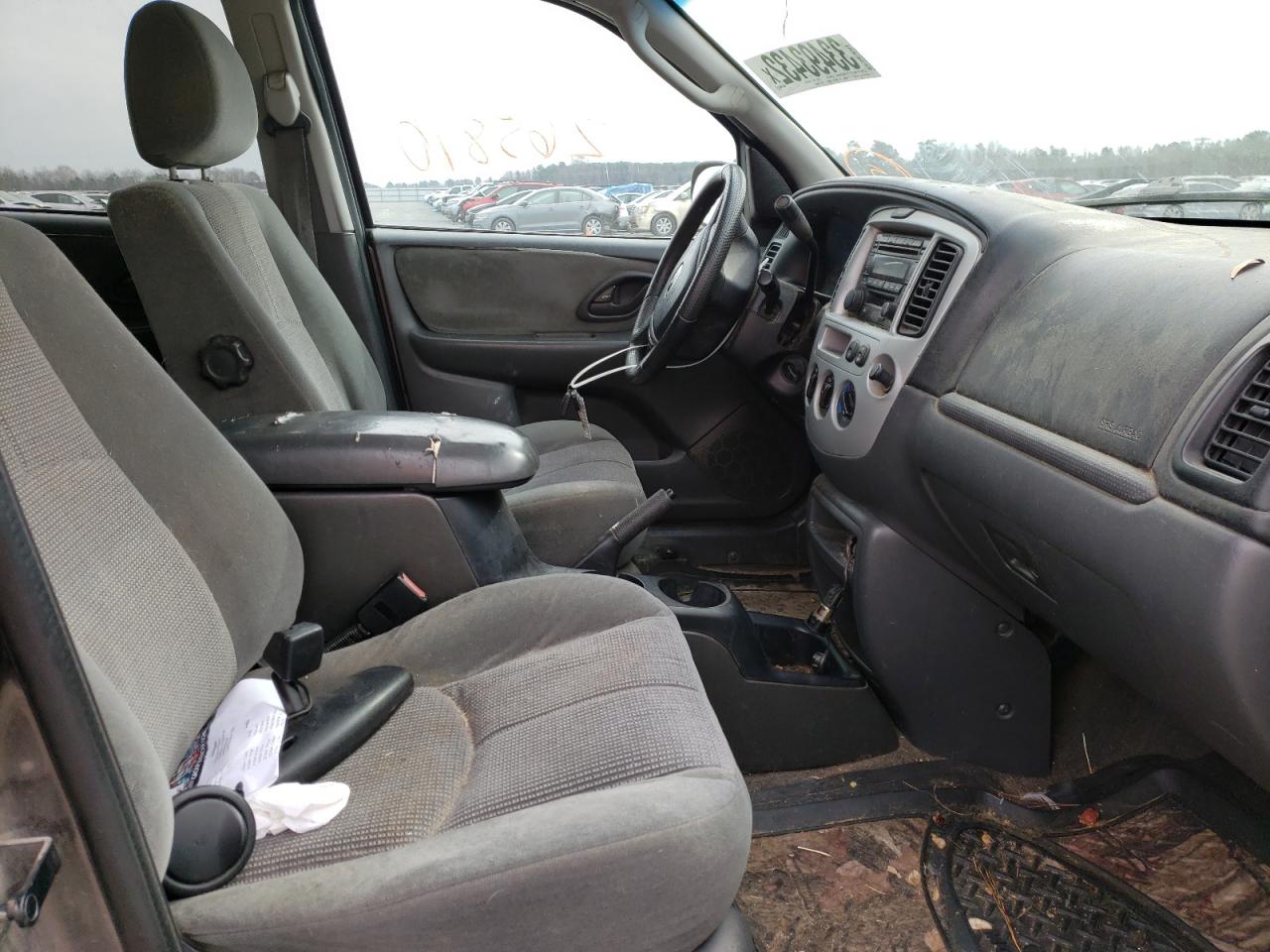 Photo 5 from auction – 2003 MAZDA TRIBUTE LX with VIN 4F2CZ94103KM14060