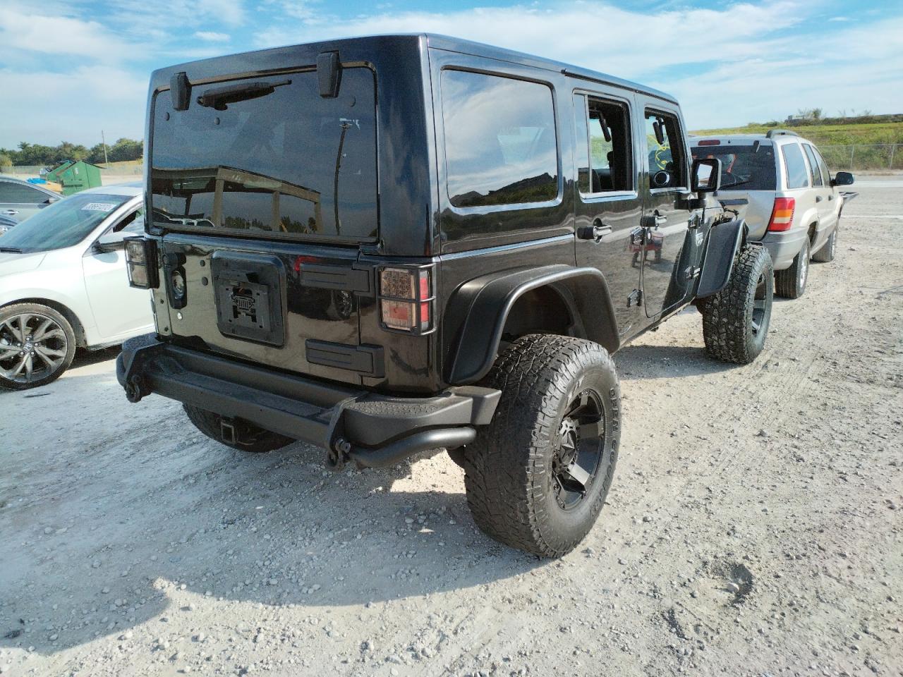 Photo 4 from auction – 2012 JEEP WRANGLER U with VIN 1C4HJWFGXCL211975