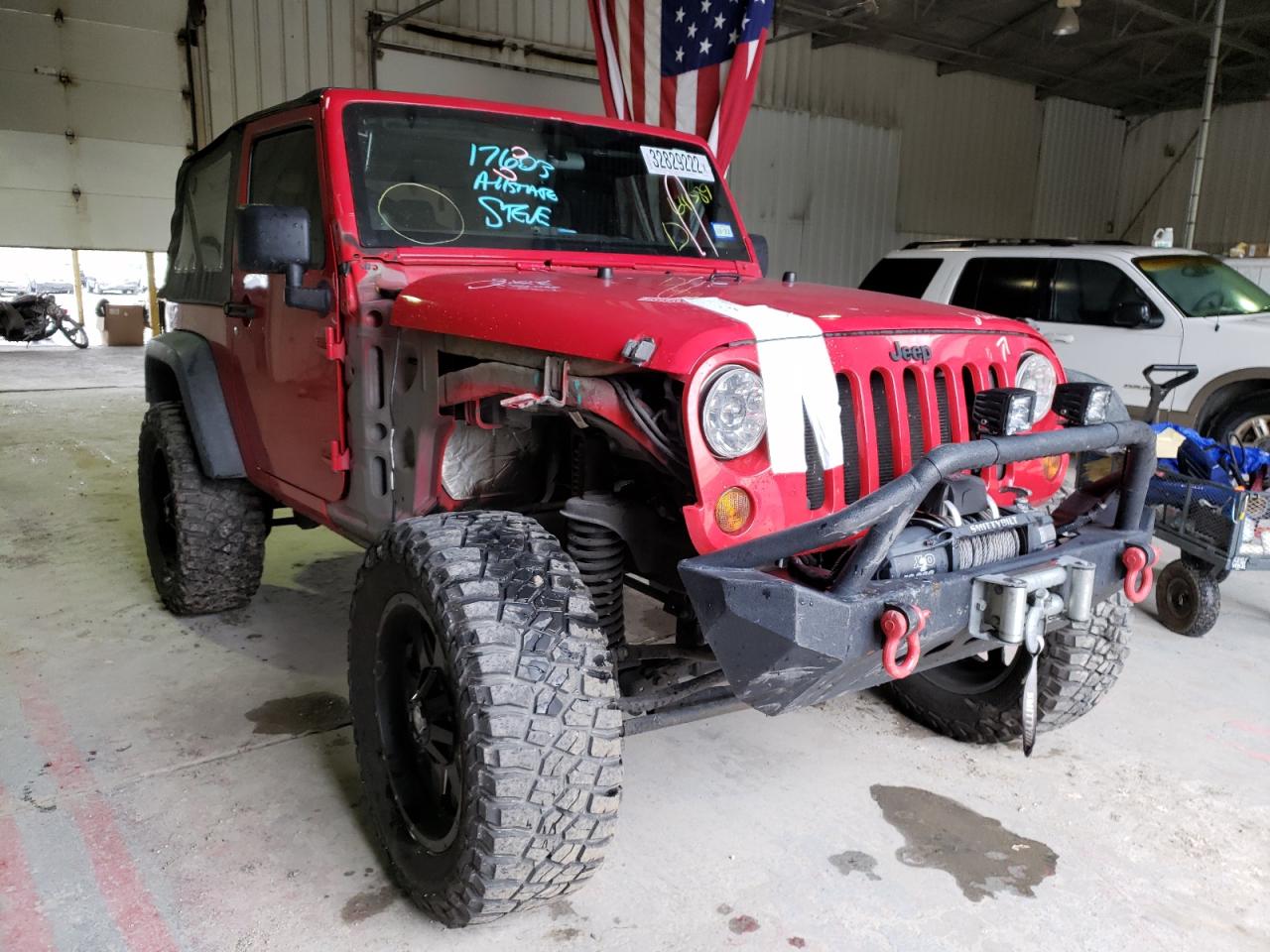 JEEP WRANGLER S 2011 with VIN 1J4GA2D12BL641589 - Photo from auction