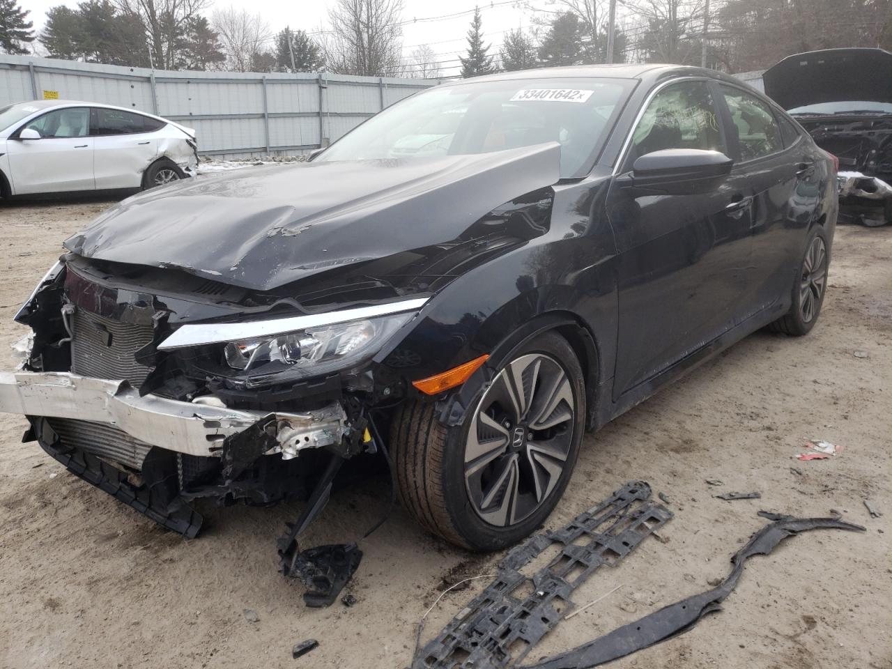Photo 2 from auction – 2018 HONDA CIVIC EX with VIN JHMFC1F3XJX039209