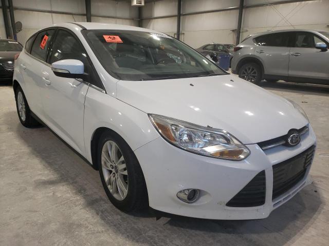 FORD FOCUS SEL 2012 with VIN 1FAHP3M23CL477218 - Photo from auction