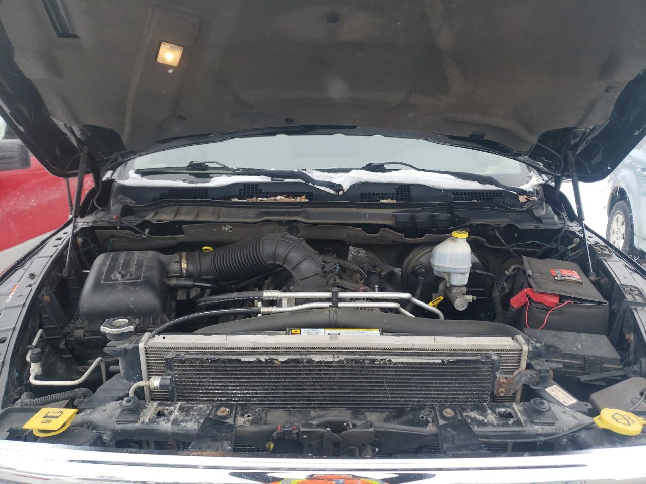 Photo 7 from auction – 2012 DODGE RAM 1500 L with VIN 1C6RD7JT6CS109334