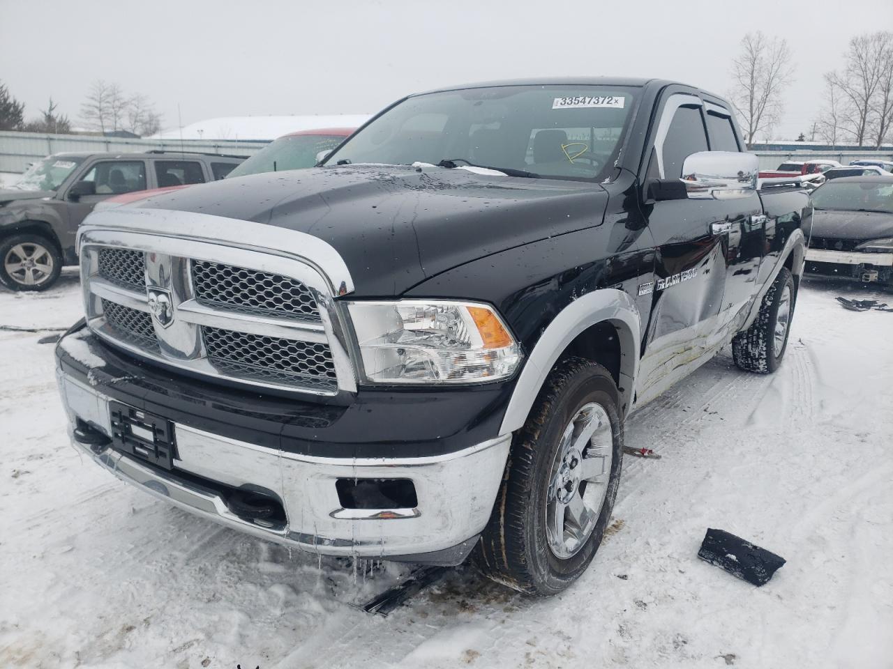 Photo 2 from auction – 2012 DODGE RAM 1500 L with VIN 1C6RD7JT6CS109334
