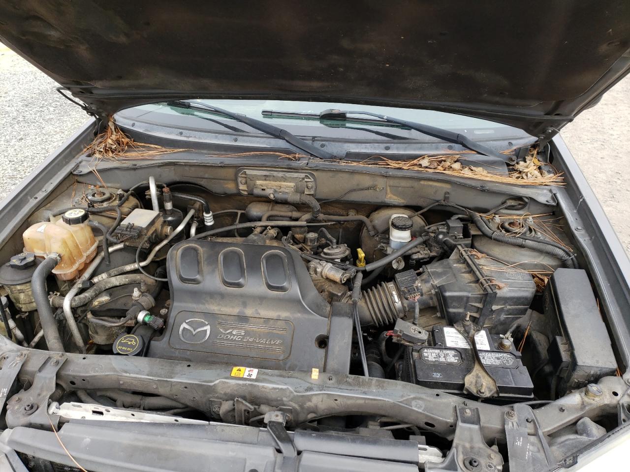 Photo 7 from auction – 2003 MAZDA TRIBUTE LX with VIN 4F2CZ94103KM14060