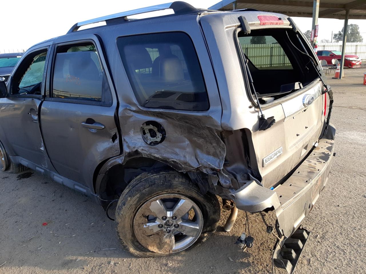 Photo 9 from auction – 2010 FORD ESCAPE LIM with VIN 1FMCU0EG3AKD20115