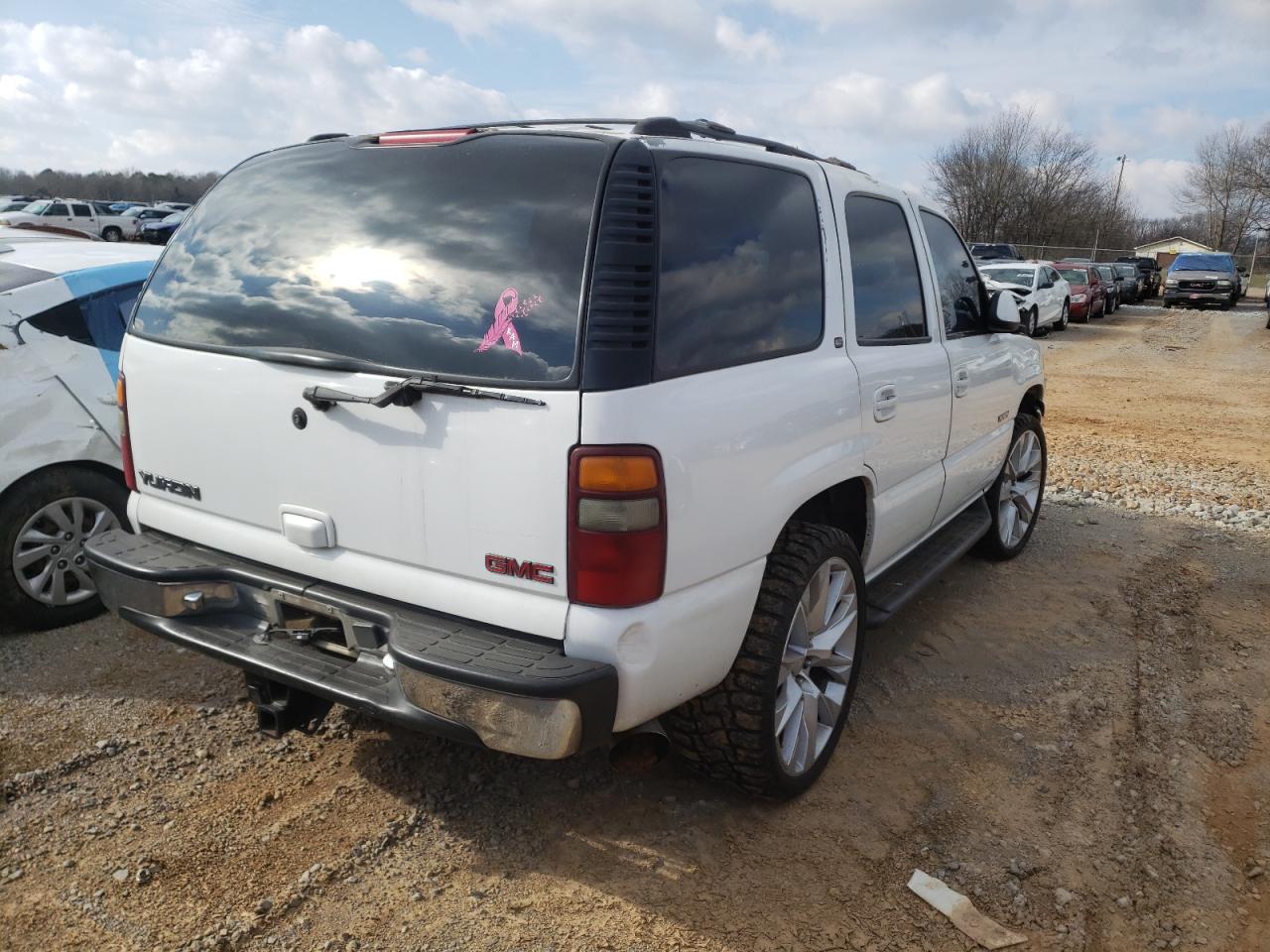 Photo 4 from auction – 2001 GMC YUKON with VIN 1GKEC13T41J249250