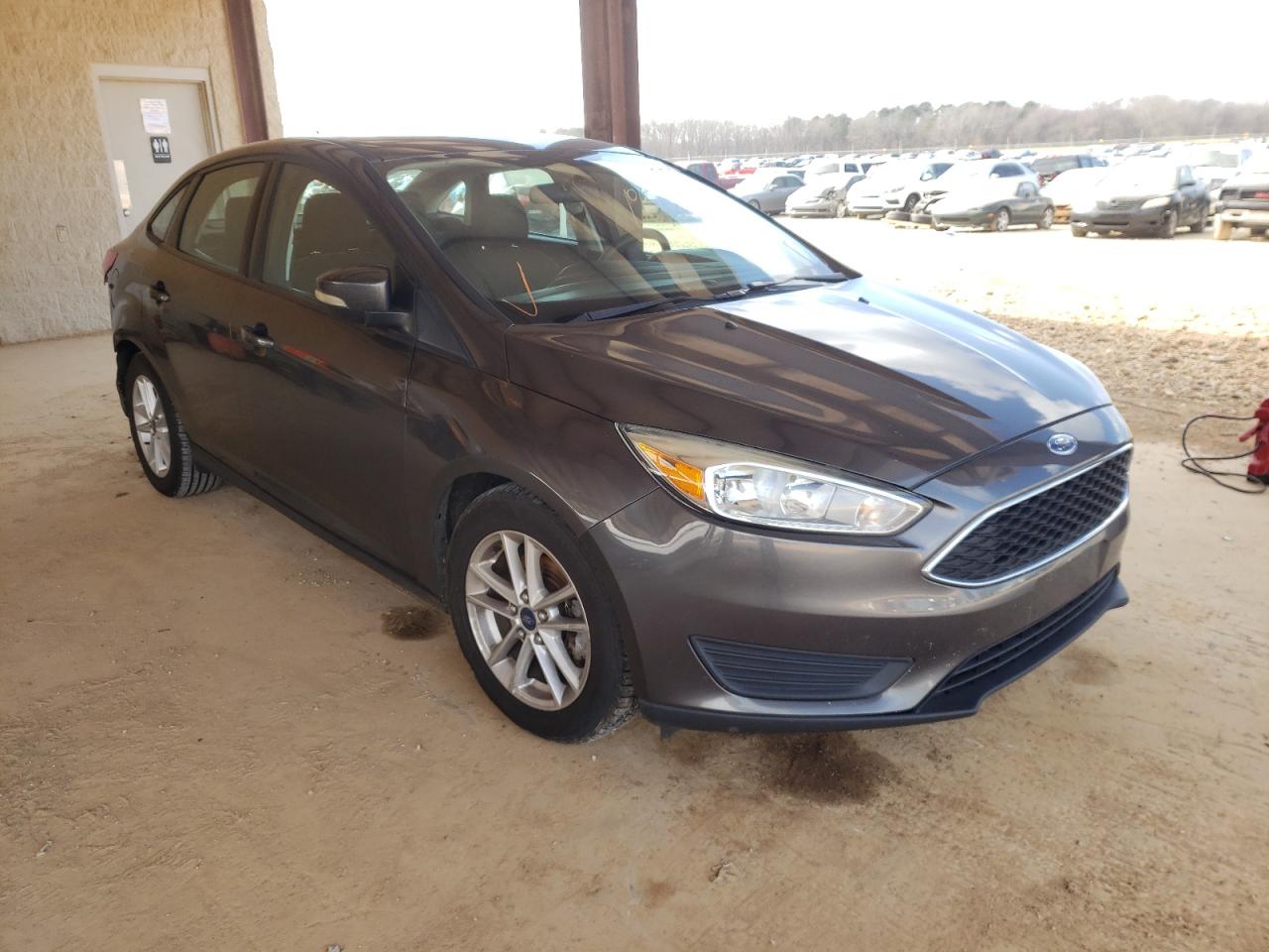 FORD FOCUS SE 2015 with VIN 1FADP3F28FL249795 - Photo from auction