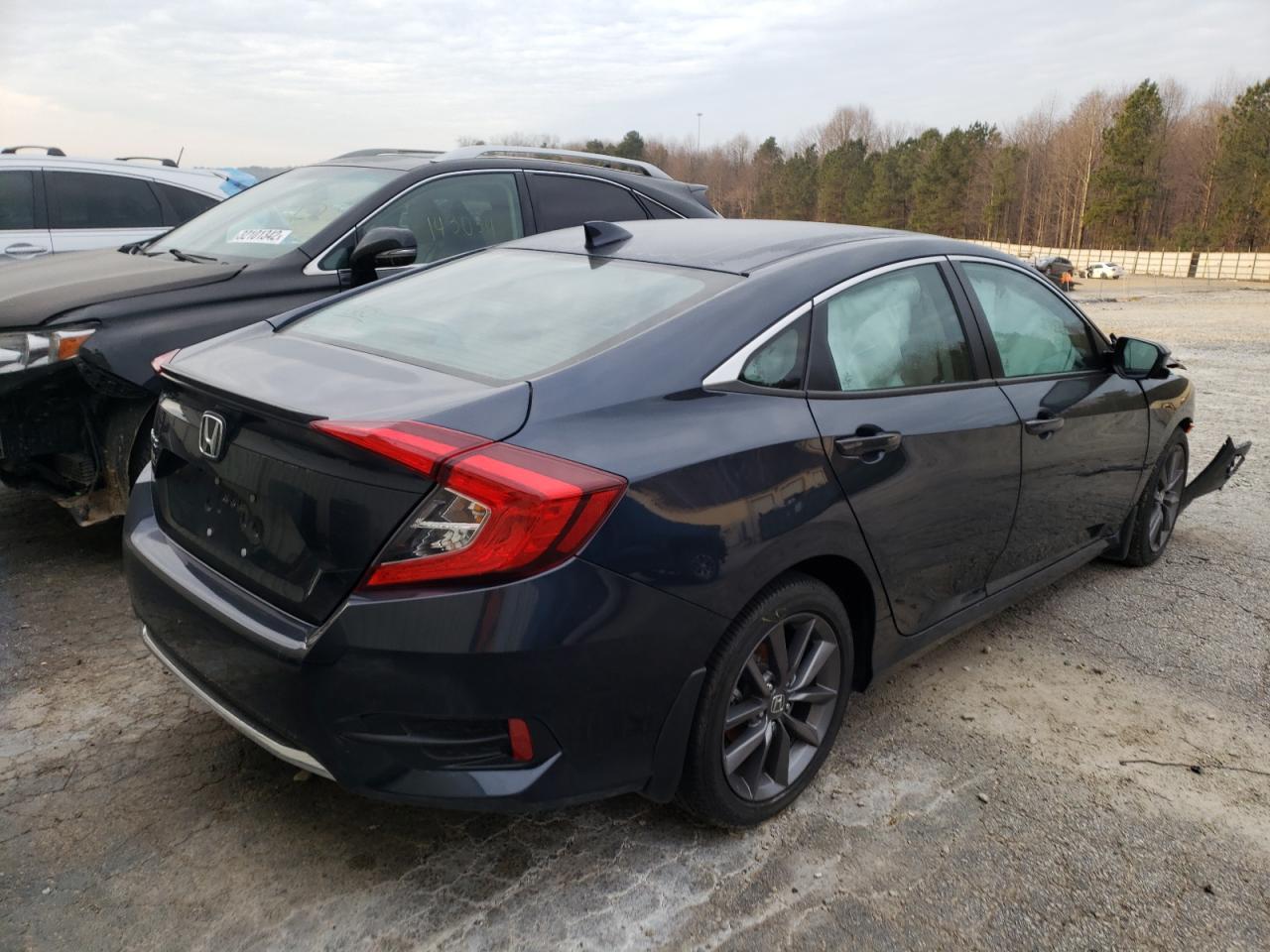 Photo 4 from auction – 2021 HONDA CIVIC EX with VIN 19XFC1F37ME012765