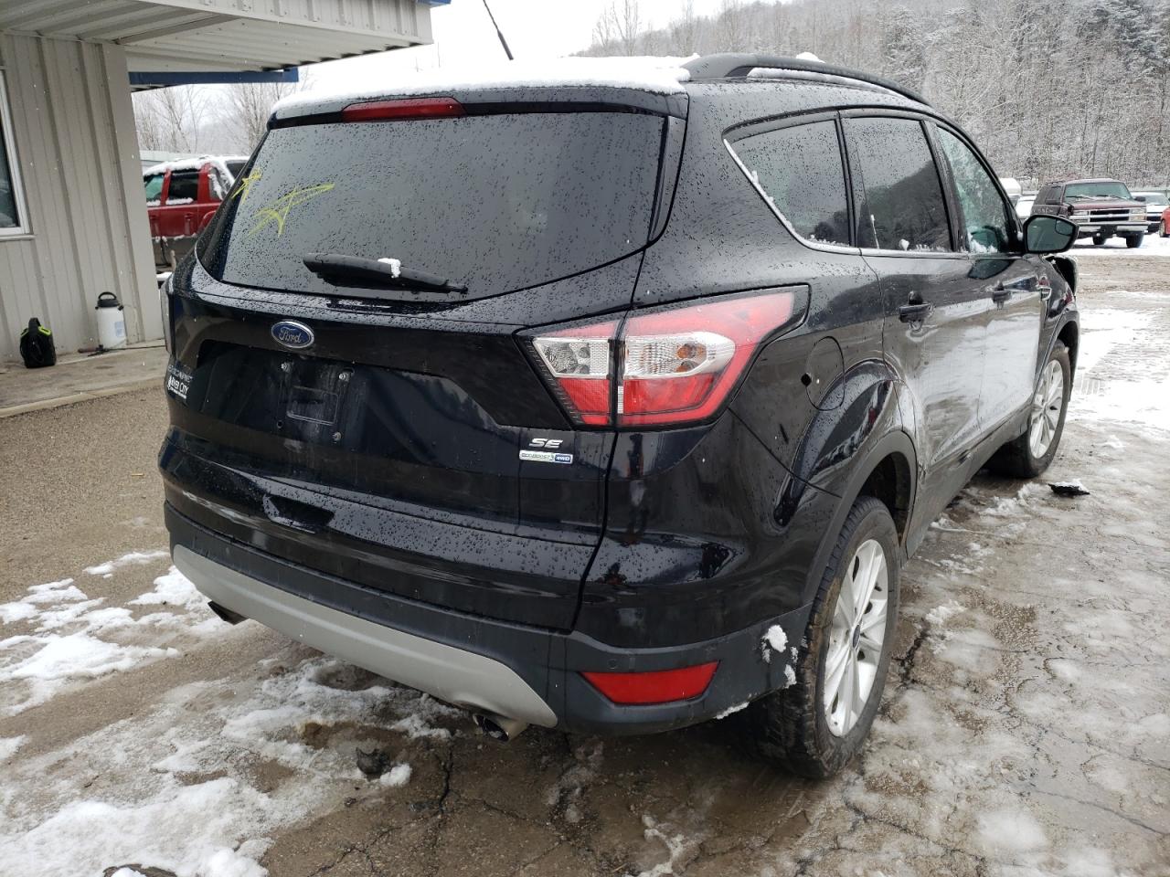 Photo 4 from auction – 2018 FORD ESCAPE SE with VIN 1FMCU9GD1JUA75360