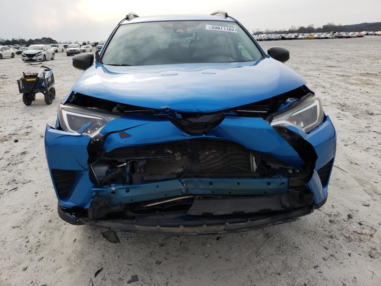 Photo 9 from auction – 2017 TOYOTA RAV4 LE with VIN 2T3BFREV0HW560169
