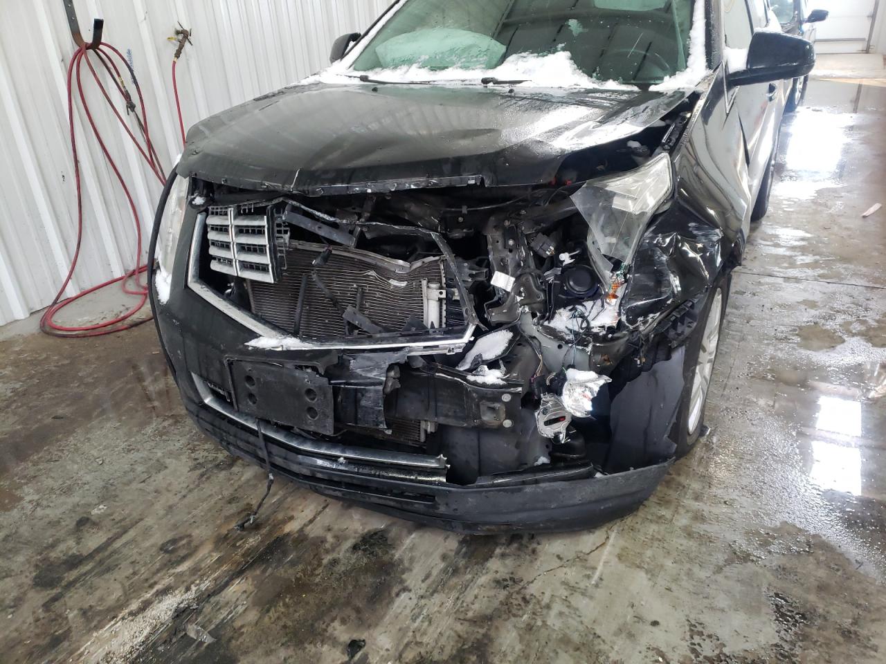 Photo 9 from auction – 2016 CADILLAC SRX LUXURY with VIN 3GYFNBE37GS535463