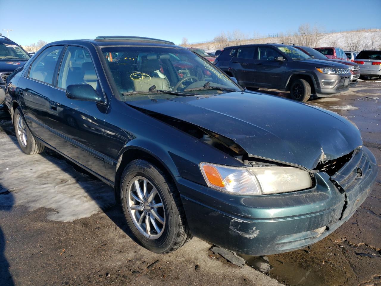 TOYOTA CAMRY LE 1998 with VIN JT2BF28K9W0103136 - Photo from auction