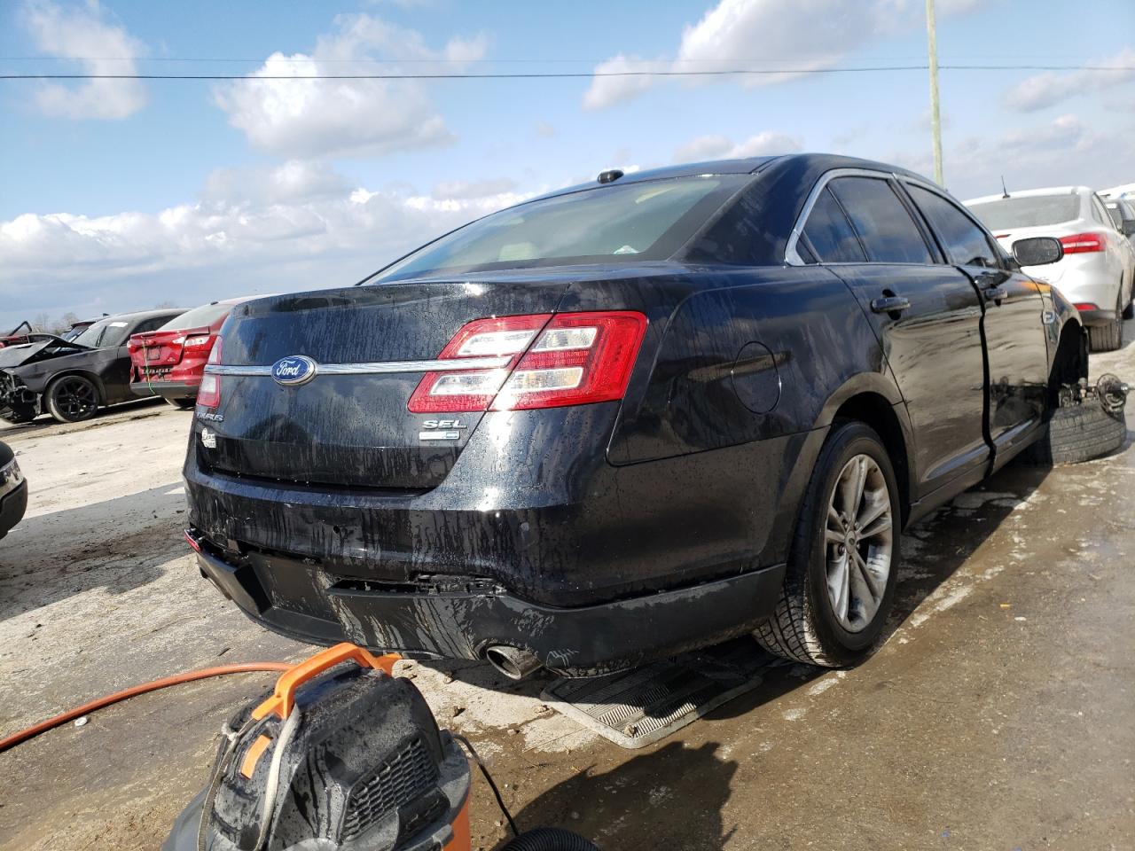 Photo 4 from auction – 2013 FORD TAURUS SEL with VIN 1FAHP2H82DG230677