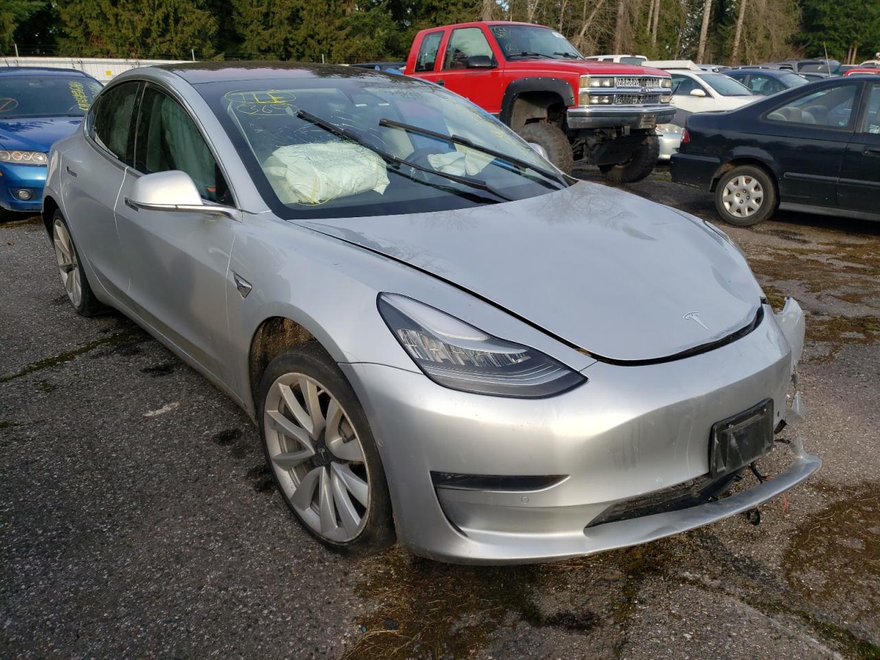TESLA MODEL 3 2018 with VIN 5YJ3E1EA7JF017936 - Photo from auction