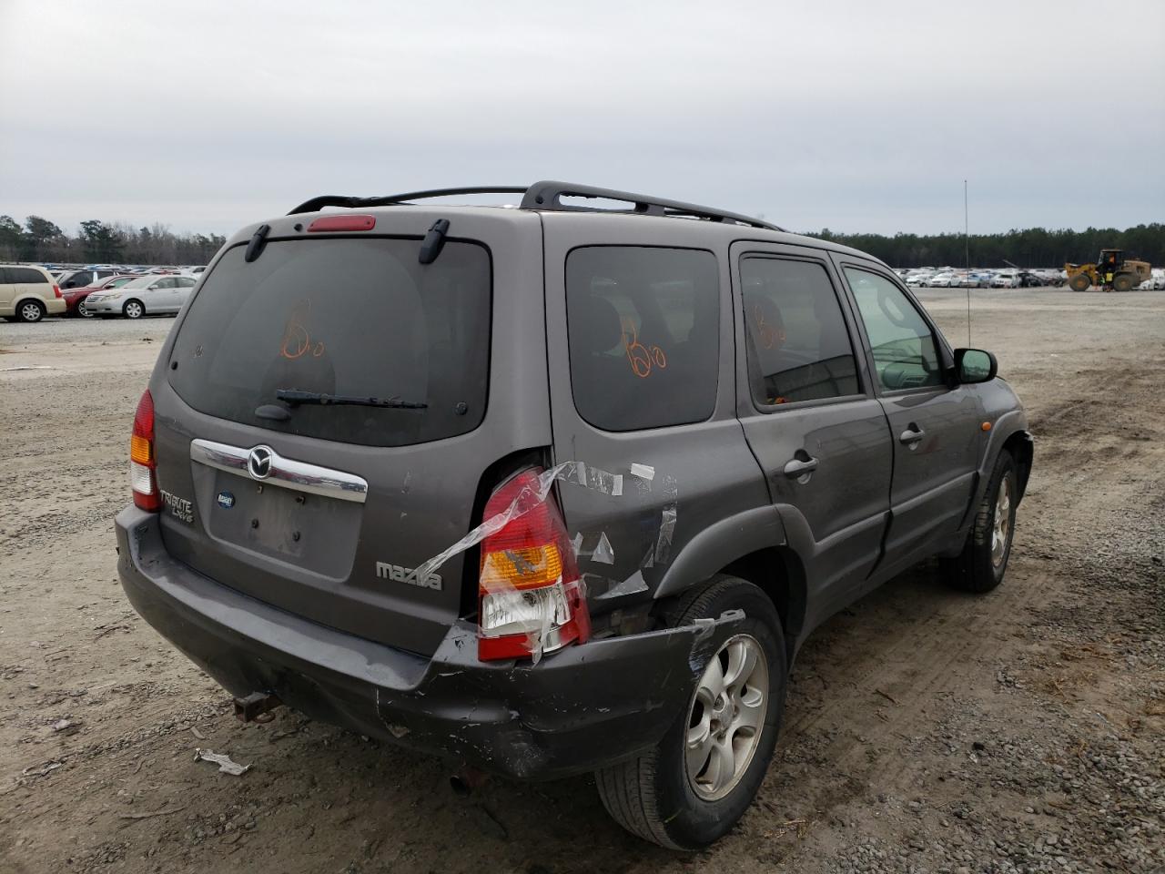 Photo 9 from auction – 2003 MAZDA TRIBUTE LX with VIN 4F2CZ94103KM14060