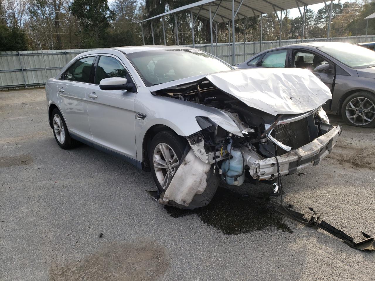 FORD TAURUS SEL 2013 with VIN 1FAHP2E80DG201604 - Photo from auction
