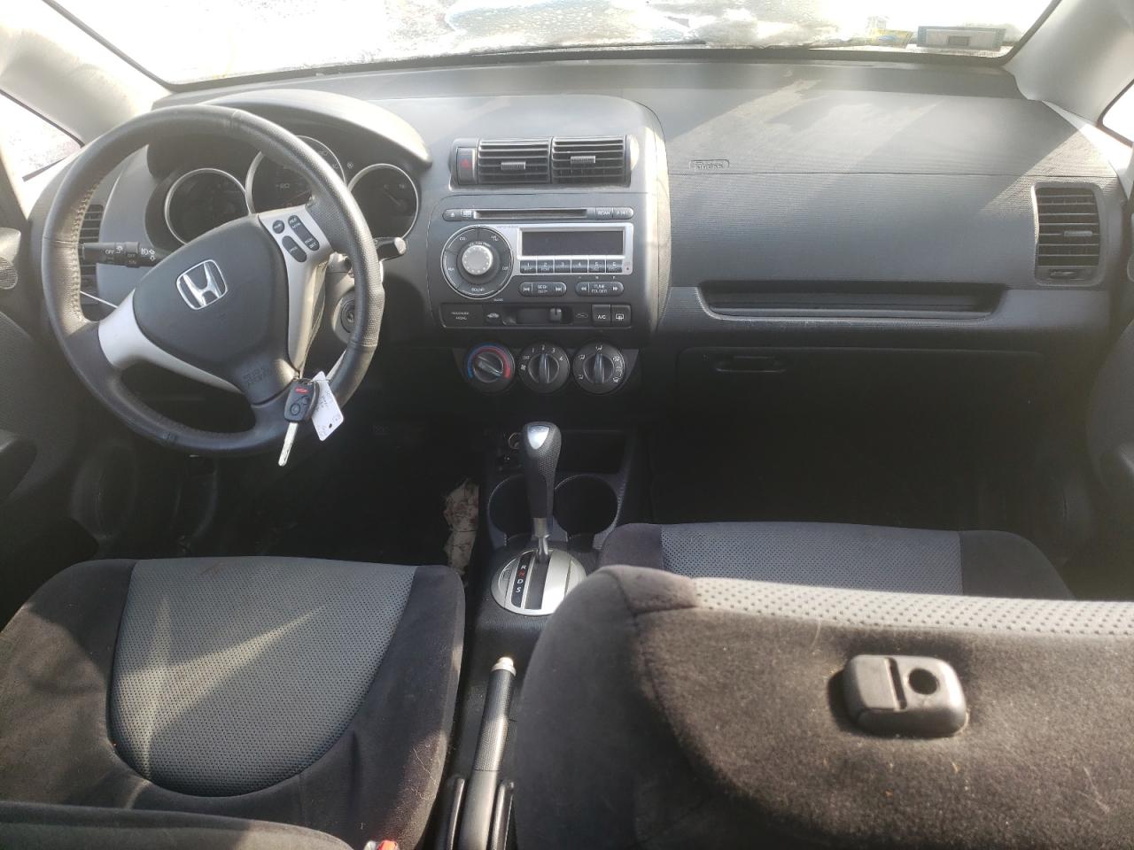 Photo 9 from auction – 2007 HONDA FIT S with VIN JHMGD38647S021833