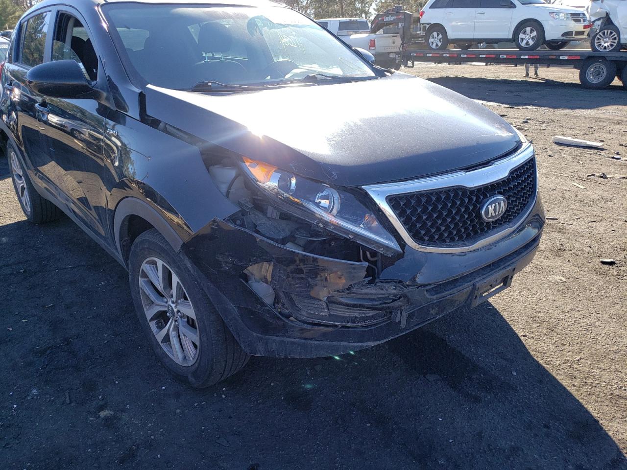 Photo 9 from auction – 2016 KIA SPORTAGE L with VIN KNDPBCAC1G7844732