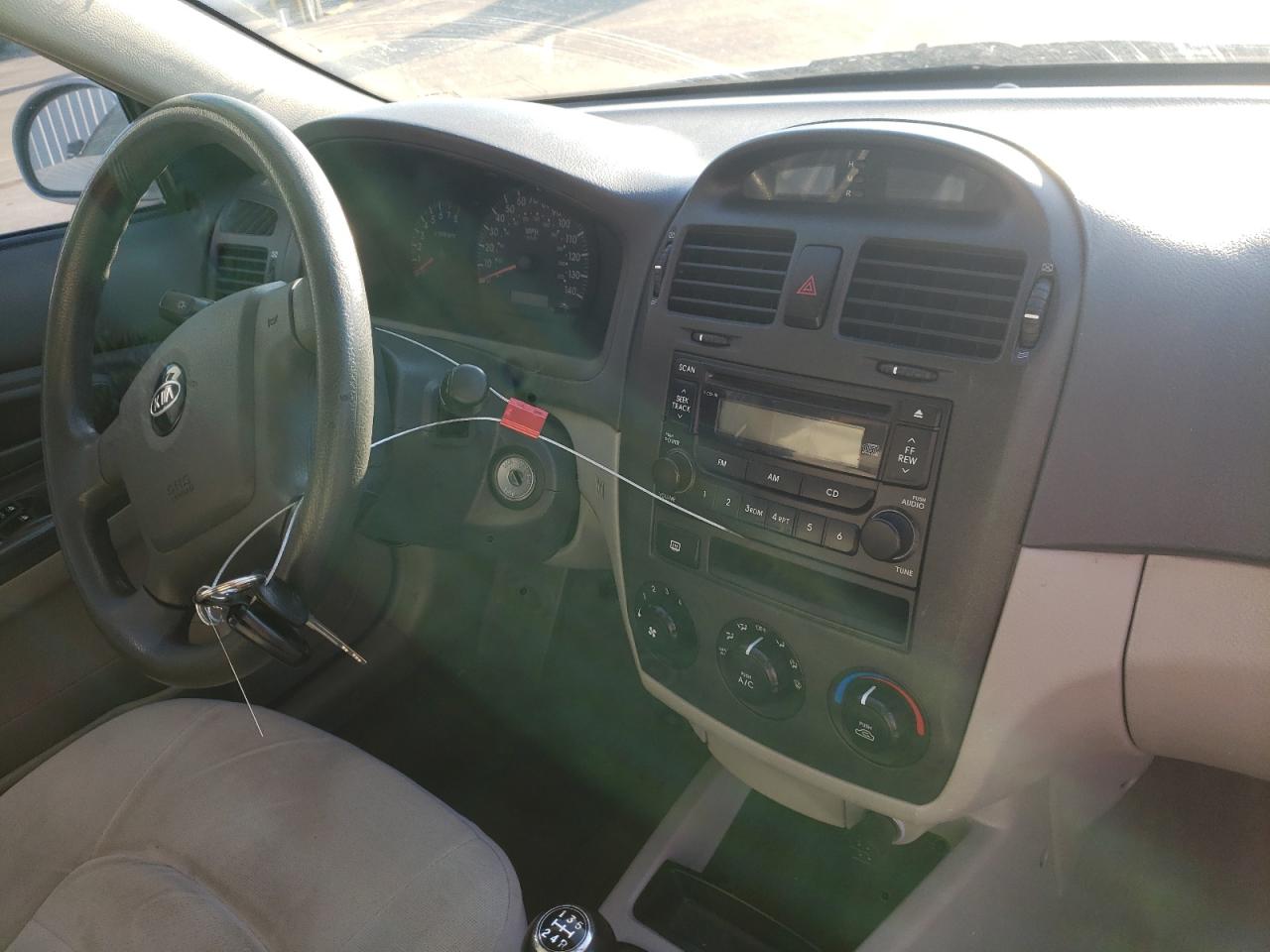 Photo 9 from auction – 2006 KIA SPECTRA LX with VIN KNAFE121465336413