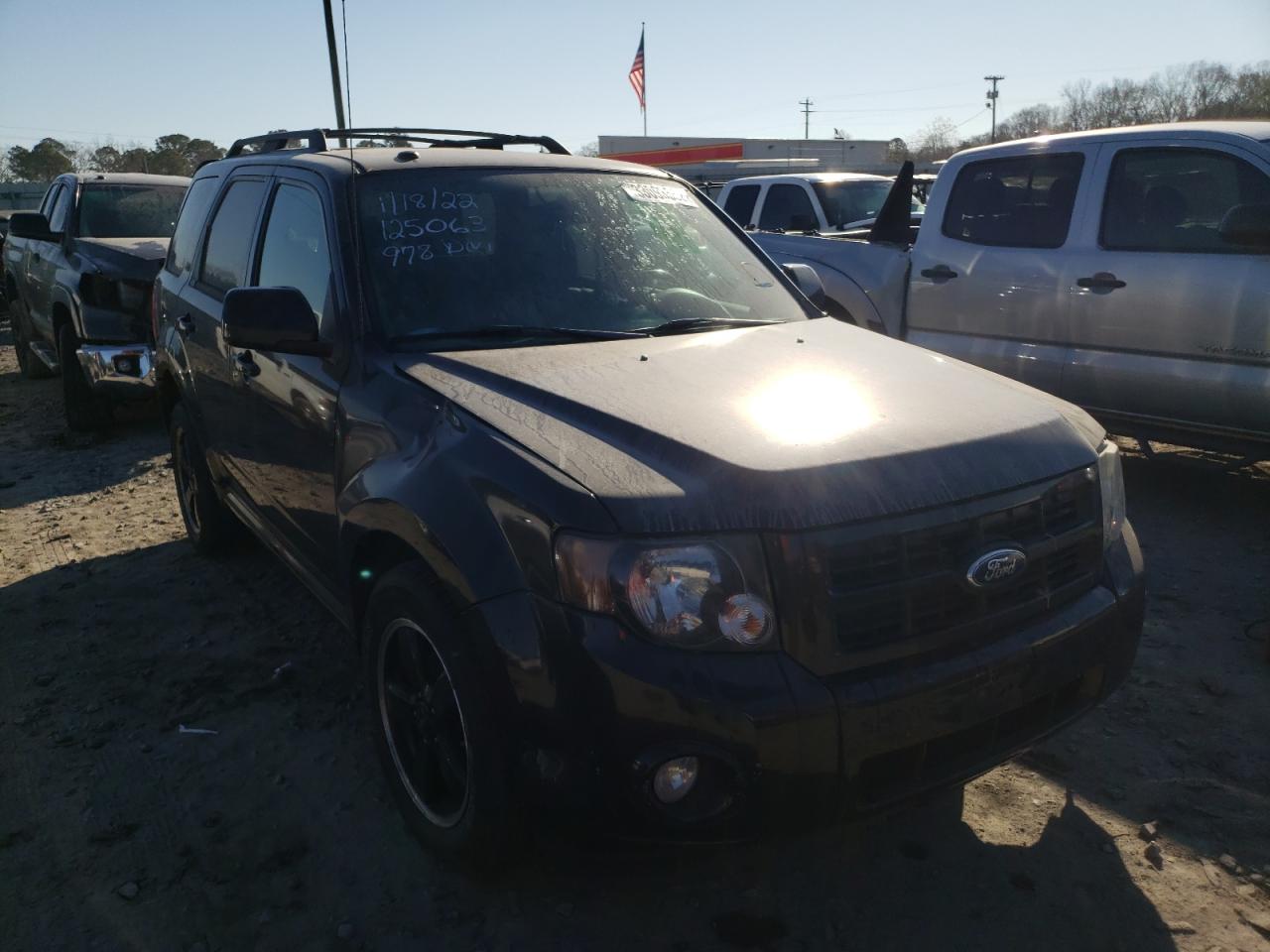 FORD ESCAPE 2011 with VIN 1FMCU9D75BKA87071 - Photo from auction