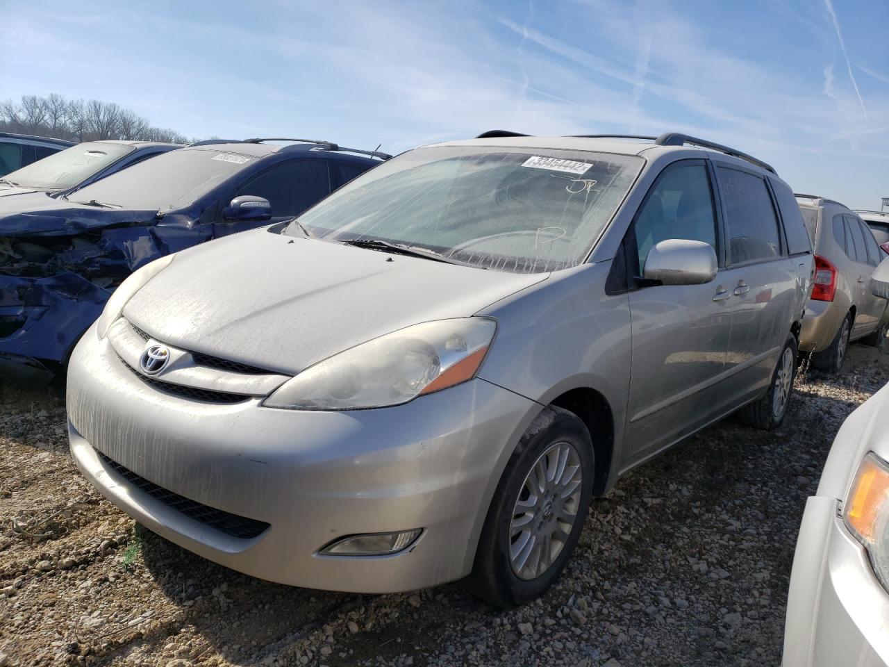 Photo 2 from auction – 2010 TOYOTA SIENNA XLE with VIN 5TDYK4CC6AS337474