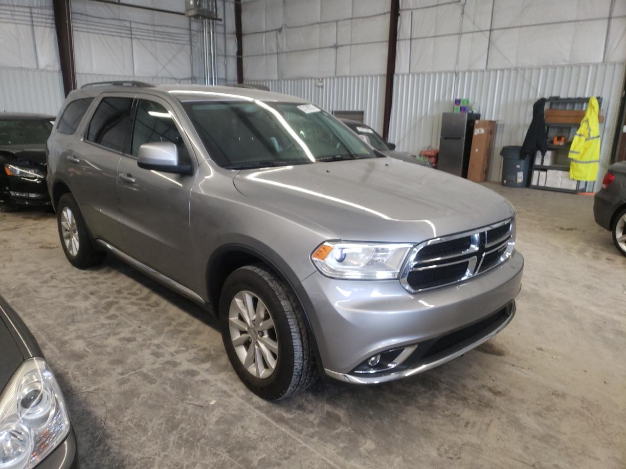 DODGE DURANGO SX 2015 with VIN 1C4RDJAG4FC245212 - Photo from auction
