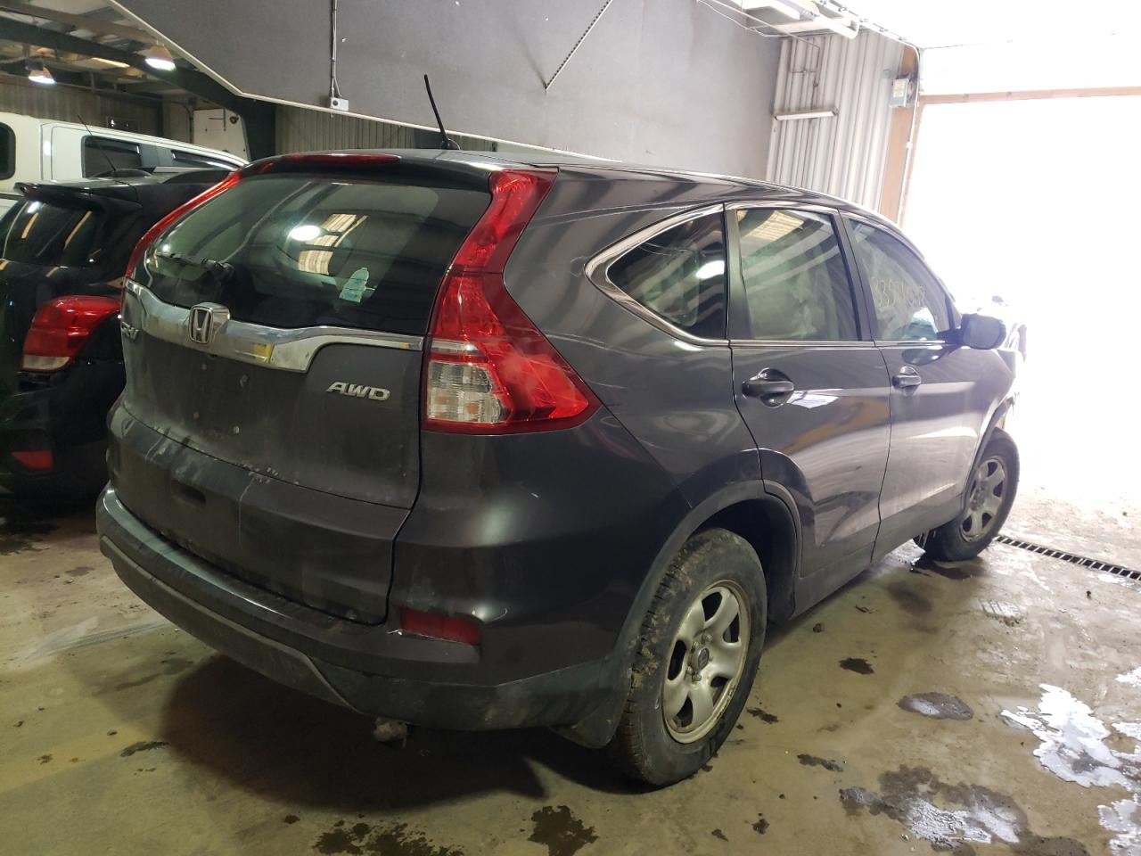 Photo 4 from auction – 2016 HONDA CR-V LX with VIN 2HKRM4H35GH612600