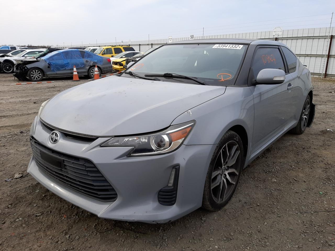 Photo 2 from auction – 2014 TOYOTA SCION TC with VIN JTKJF5C79E3077893